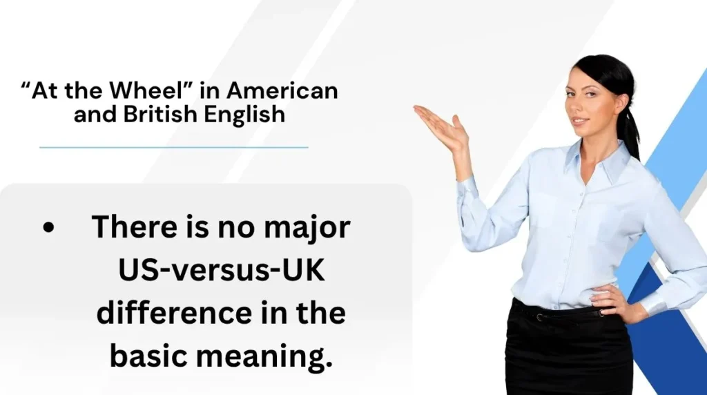 At the wheel is used in both American English and British English.